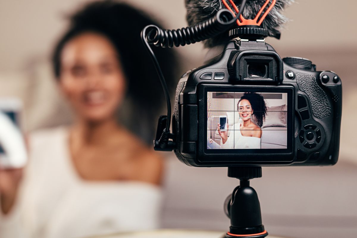 Customer engaging with an interactive video on a digital device for marketing purposes.
